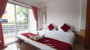 Katil atau katil-katil dalam bilik di Shree Krishna Guest House