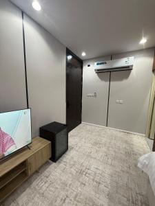 Postel nebo postele na pokoji v ubytování غرفة ستوديو فندقية