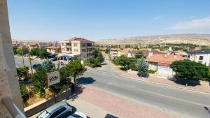 a view of a city with a street and buildings at Peribacası Manzaralı Modern Daire 2 in Urgup +9 photos