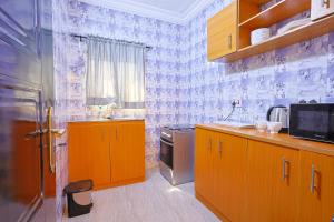 Una cocina o cocineta en Victoria Flats