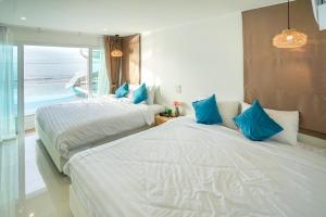 Ένα ή περισσότερα κρεβάτια σε δωμάτιο στο Bubble Sea Beachfront Chaam +31 φωτογραφίες