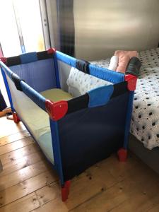 Ένα ή περισσότερα κρεβάτια σε δωμάτιο στο Appartement cosy avec grande terrasse vue mer