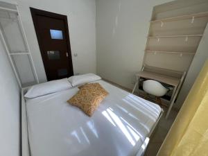 Katil atau katil-katil dalam bilik di Dreaming About Italy