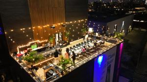 an overhead view of a stage with lights on a building at Nova Hotel Brooklyn in Brooklyn
