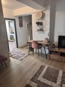 Телевизор и/или развлекательный центр в Apartament 3 camere