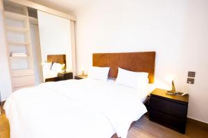 Ένα ή περισσότερα κρεβάτια σε δωμάτιο στο 2BR Townhouse In Central Kigali