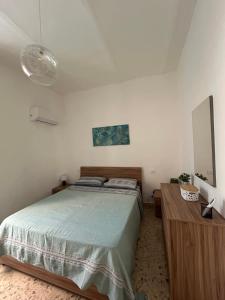 Ένα ή περισσότερα κρεβάτια σε δωμάτιο στο Casa Rosa - Vasto