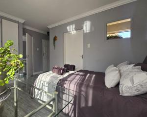 Postel nebo postele na pokoji v ubytování ROOMHeidelberg