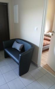 Postel nebo postele na pokoji v ubytování Tęczowe Wzgórze Bieszczady