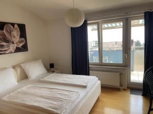 Ένα ή περισσότερα κρεβάτια σε δωμάτιο στο Penthouse Seeblick