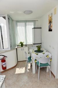 O bucătărie sau chicinetă la Casetta Achille +17 fotografii