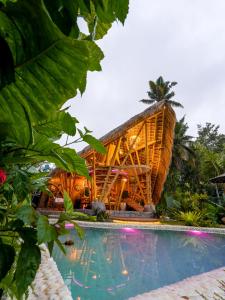 Πισίνα στο ή κοντά στο Lazy Coconut Bali