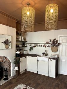 Dapur atau dapur kecil di Rufloreo Flats 1 - central gem