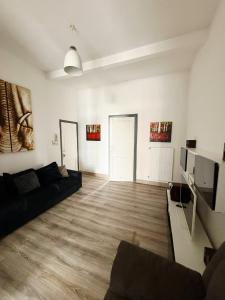 TV a/nebo společenská místnost v ubytování Appart Pauli + 3 fotografie