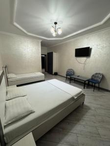 Ένα ή περισσότερα κρεβάτια σε δωμάτιο στο Imereti