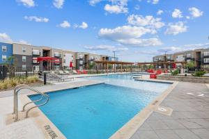 an image of a swimming pool at a apartment complex at Luxury Home W Pool & Gym Mins To Baylor Hospital in Marble Falls