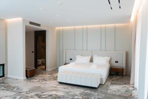 Postel nebo postele na pokoji v ubytování Ilyonis Hotel & Spa + 111 fotografií