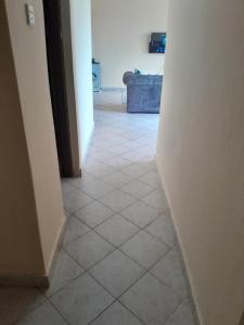 Katil atau katil-katil dalam bilik di Cozy escape in Diani darad