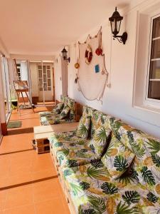 Ένα ή περισσότερα κρεβάτια σε δωμάτιο στο Beachfront Surf & Holiday House, Charming & Quiet