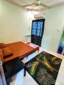 Photo de la galerie de l'établissement Homestay No. 8, à Segamat