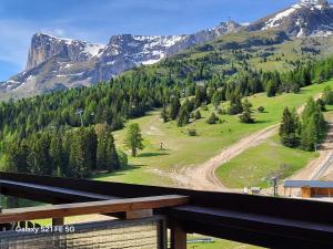 a view from the balcony of a mountain at Logement parents CAMP BASKET SUPERDEVOLUY in Le Dévoluy