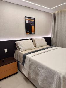 Ένα ή περισσότερα κρεβάτια σε δωμάτιο στο Flat Beachclass Meireles studios