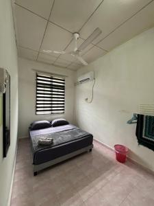 Katil atau katil-katil dalam bilik di NovaHaus1 Homestay Gong Badak