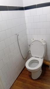 a bathroom with a white toilet in a room at Joli chambre au coeur de tanger in Tangier +6 photos