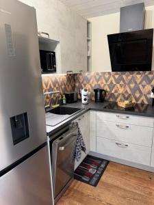 Kuchyň nebo kuchyňský kout v ubytování La Piôle du Lac