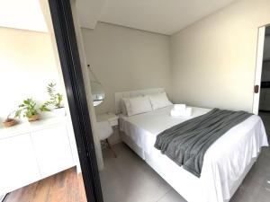 Postel nebo postele na pokoji v ubytování Loft Lopes