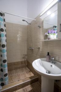 a bathroom with a sink and a shower at Gennadi Sea Escape in Gennadi