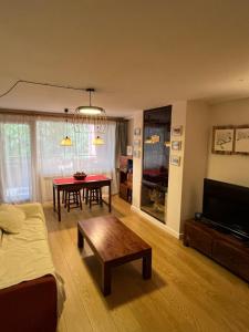 Et tv og/eller underholdning på Apartamento en Cerler 1F