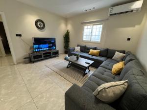 Χώρος καθιστικού στο شقة فاخرة Luxury 1BR Apartment