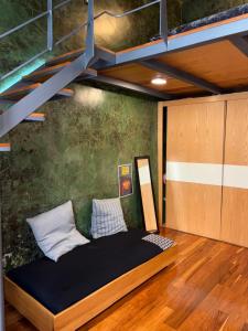 a bedroom with a bed in a room at Latidos del Centro de CDMX in Mexico City