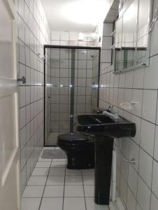 Ένα μπάνιο στο Apartamento Vó Maria