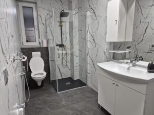 Koupelna v ubytování Casa da Vinci + 10 fotografií