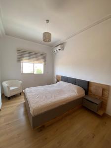 Ένα ή περισσότερα κρεβάτια σε δωμάτιο στο You'll be comfortable there!