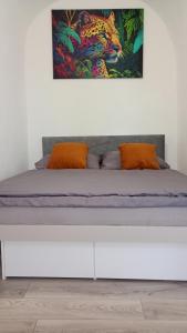 Katil atau katil-katil dalam bilik di Alma Apartment DOWNTOWN