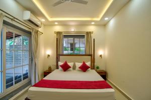 Ένα ή περισσότερα κρεβάτια σε δωμάτιο στο Tranquil 3bhk Pvt Pool Villa +21 φωτογραφίες