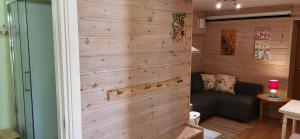 a wooden wall in a tiny house at Marias Guesthouse in Tromsø