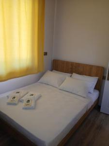 En eller flere senge i et værelse på The Little Prince Hotel