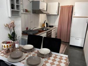 Kuchyň nebo kuchyňský kout v ubytování Zentral und sehr Gemütlich