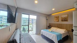 En eller flere senge i et værelse på Flat Mana Muro Alto + 58 billeder