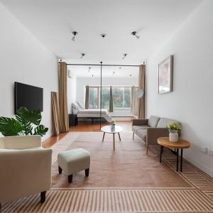 Μια τηλεόραση ή/και κέντρο ψυχαγωγίας στο Bowery Two Bedroom