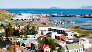 an aerial view of a small town with a harbor at Melancholia apartment in Sauðárkrókur