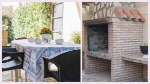 a table in front of a brick fireplace at Casa Flor de La Jara - An elegant rural retreat in Cobisa +44 photos