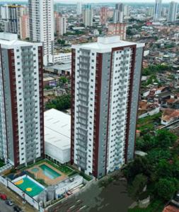 an aerial view of a city with tall buildings at Apto moderno COP30 com Área de Lazer e Estacionamento in Belém