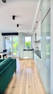Кухня или мини-кухня в My Happy Home - Rodzinny Apartament przy Parku
