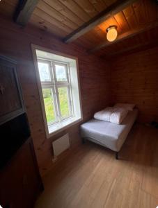 Gallery image of Koselig gårdshus in Hjelmås
