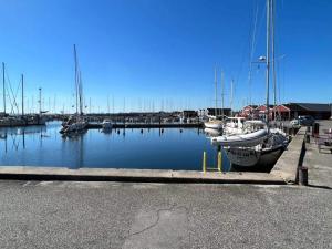 a marina with boats parked in the water at 6 person holiday home in Hadsund-By Traum in Hadsund